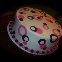 Hot Pink, Black Funky Circles Graduation cake, made cupcakes to match.