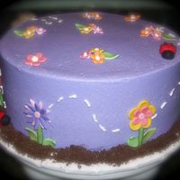 Garden Party Garden party themed birthday party. Butter cream frosting, fondant accents.