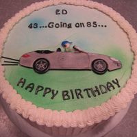 Porsche Convertible Cake This gentleman bought himself a prosche convertible for his birthday. His wife wanted to gently poke fun at him.