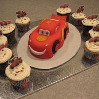 Lightning Mcqueen With Cupcakes I added cupcakes for additional servings as this cake is pretty small. I used the theme cupcake liners and little picks to make it more...