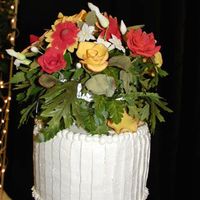 My First Cake Topper I love to make gumpaste flowers but this is the first time I made a topper for a cake. The flowers traveled on the plane with me from NJ to...