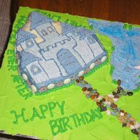 Castle Birthday Made using the Wilton Castle pan. It was for a birthday/anniversaryso I wrote ...and they lived happily ever after around the castle....
