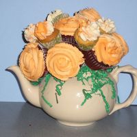 Teapot Bouquet Red Velvet and lemon cupcakes with buttercream frosting