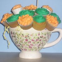 Teacup Bouquet Cupcake bouquet in a teacup planter
