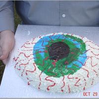 Spooky Eye For a Halloween Potluck party, didn't turn out quite how I wanted...but it was still cute. I used the Wilton Football pan.