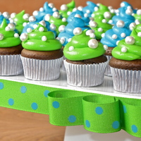 Polka Dot Cupcakes Baby shower cupcakes #2. Chocolate cupcakes, vanilla/almond buttercream and fondant beads covered in pearl dust.