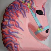 Meryl's Horse Cake Yellow cake with butter cream frosting. Fondant accents.