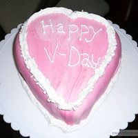 Valentine's Cake I'm embarrassed to post this, but this was my first time trying MMF and hand carving the shape of a cake. Unfortunately the fondant...