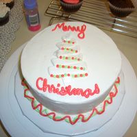 Christmas Tree I got this idea from a lady who posted a gorgeous cake on her flickr account. This is my feeble attempt, but it's not too bad....
