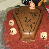 Coffin This is my copy of a cake I saw done by KoryAK. Red velvet, cream cheese filling and Rhonda's chocolate MMF. TFL!