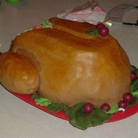 Gobble It Up. My first attempt at carving. Covered in marshmallow fondant with marzipan decoration.