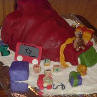 Oops Santa Dropped His Bag i did this for christmas for my family. its covered in fondant and has marzipan and rice crispies decorations.