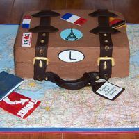 Happy Birthday And Bon Voyage! did this buttercream cake with fondant accents for a college student getting ready to study abroad