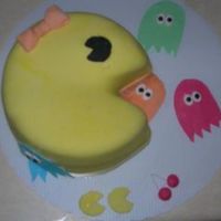 Ms. Pac Man This was for a friend who loves video games. I thought I would go old school.The cake is chocolate with caramel filling, chocolate frosting...