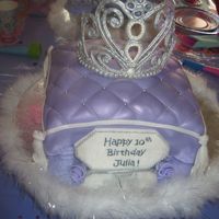 Tiara On Pillow This was my first attempt at a pillow and tiara cake. Cake is covered with fondant with silver dragees, dusted with amathyst lustre dust....
