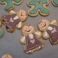 Practice Baby Shower Cookies royal icing/glace mixed together. Faces painted on with food color. These were so fun to do!