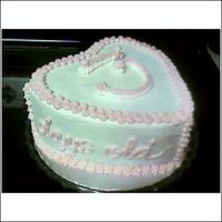 Wilton Class 1 - Cake #1 My boss was disturbed by the idea that I would bake a cake over the weekend, frost it in class on Tuesday, and he would eat it on Wednesday...