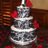 Mosaic Cake This is my favorite cake yet! It was so much fun to do. White buttercream with black fondant mosaic pieces. Some were painted with luster...