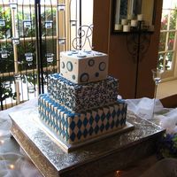 Blue Whimsy All buttercream cake with fondant circles and diamonds. This was a fun cake to do! TFL!