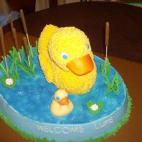 Mommy And Baby Quack Large Wilton Oval, 3-D rubber duck pan, chocolate baby duck, cattails, foilage, lilly pad and flowers are made of royal icing. All are...
