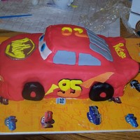 Lightning Mcqueen Just made this cake for the son of one of my husband's employees. My first fondant cake ever, as well as my first carved cake! Done in...