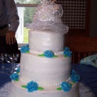 My First Ever Wedding Cake!!! Did this cake for my dad's wedding (today! 8/29/09). All done in buttercream. I can pick out dozens of imperfections, but for my first...