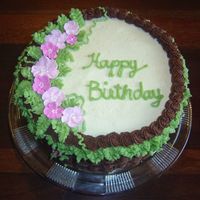 Basketweave Birthday Cake Chocolate and vanilla layer cake with fudge filling and chocolate & vanilla buttercream frosting. Royal icing flowers.