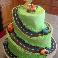 Alex's 2Nd Birthday Cake My version of bjfranco's cake. I made this for my son's 2nd birthday. This was my first time carving on a cake. Also my first...