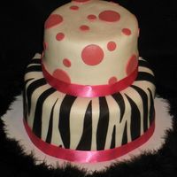 Ashley's Zebra This was made for a friend's birthday party. She requested zebra stripes and pink polka dots, so that's just what she got! I also...