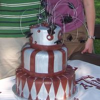 Aggie Graduation I made this cake for my brother and his wife, who just graduated fromTexas A&M. You may not be able to tell, but the swirlies have...
