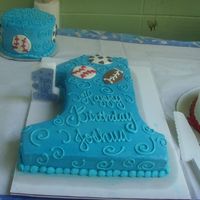 Joshuas First Birthday i made these for my nephews birthday. his mom emailed me the picture of the # 1 cake she found on cc so i dont know who the original...