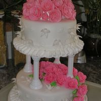 P1010072.jpg This was my wilton class wedding cake 1st one fondant with gumpaste flowers