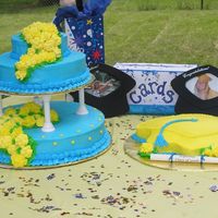 P1010002.jpg I made this for my sisters hs graduation this was my first tiered cake