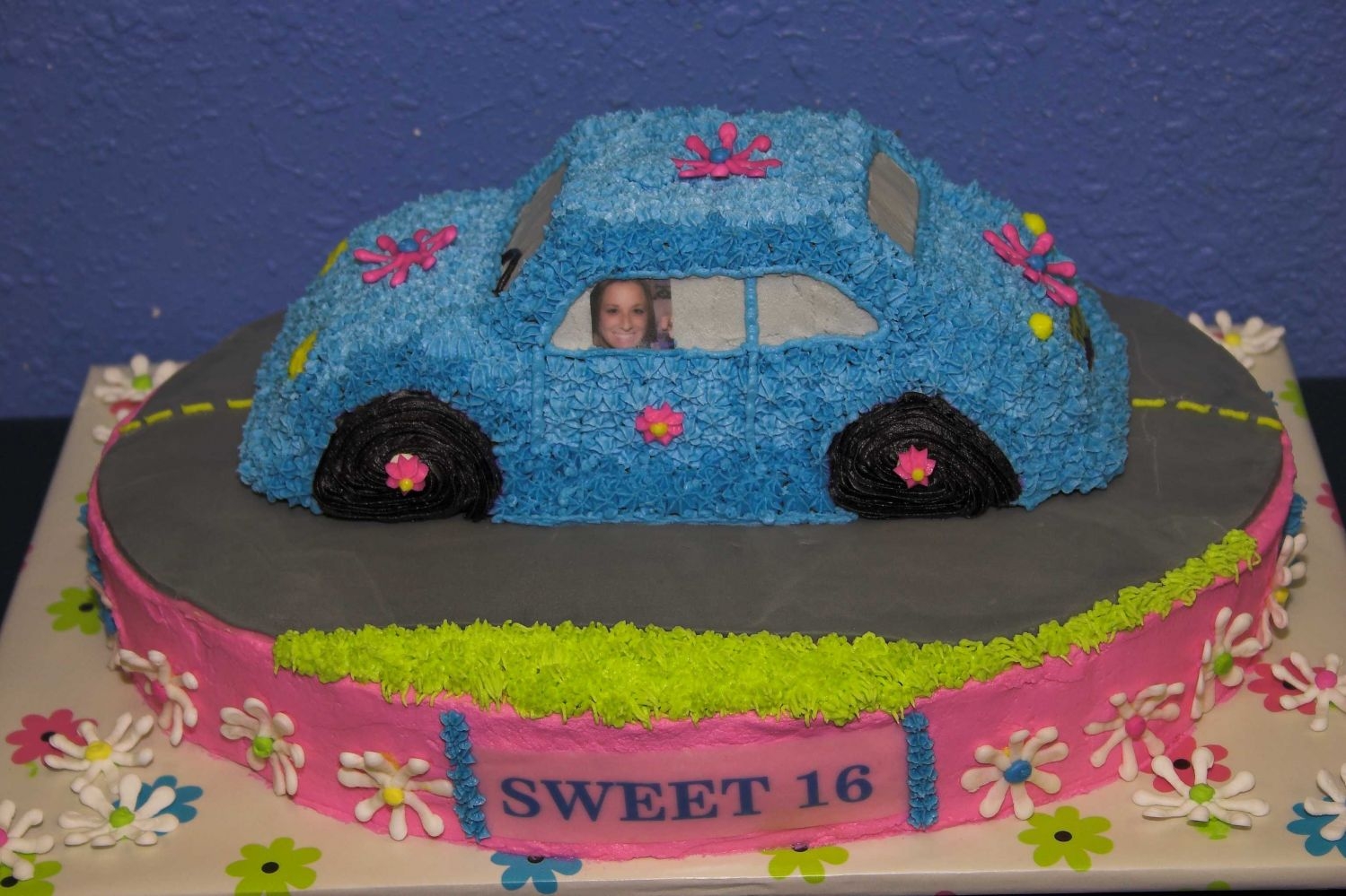 Sweet 16 Volkswagon Cake (Front View) This is my daughter's sweet 16 cake that my mother-in-law, daughter-in-law, and even my husband helped me out on. It's a fudge...