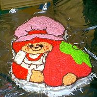 Strawberry Shortcake This is the very first cake of this type I've ever done. It was for my own birthday (hehe) and I messed up pretty badly on the face,...
