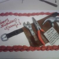 Harry's Tool Belt Butter pecan cake with buttercream frosting and fondant tool belt and tools.All tools were hand molded from fondant.