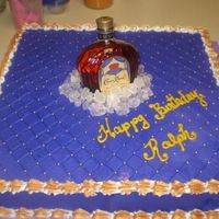 Crown Fit For A King Crown Royal on ice made with buttercream icing and rock candy for ice