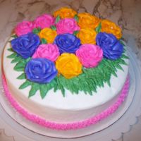 Mother's Day Roses Hi All - This cake is a first of sorts. This is the first time I attempted roses for a cake and the first time I attempted an 8 in round...