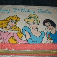Disney Princess Cake First time with this type of art. I found a few new uses for wax paper and a freezer. The little girl loved how big the Disney girls were....
