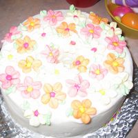 Marshmallow Flower Cake I just cut up miniature marshmallows to assemble these flowers. Keep a small bowl of water nearby to clean your scissors, as they will get...