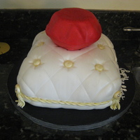 Ruby Marble cake with vanilla buttercream and then covered in mmf. Ruby is made out of RKT and then covered in mmf.