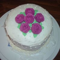 Course 1, Cake 3 (Course 1 Final) Yellow cake with class BC icing...my instructor showed me how to ice the cake smoothly without too many crumbs when I was about half-way...