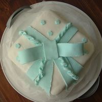 Course 3, Cake 1--Fondant Bow Cake First time working with MMF--didn't like it. This was a French Vanilla cake with French Vanilla pudding...forgot to brush off the...