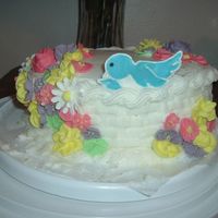 Course 2 Final DH French Vanilla Cake with Jell-O French Vanilla Instant pudding mix added (so good) with class BC icing. The flowers are RI and the birds...