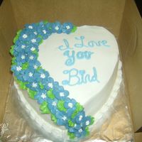Blue Flower Love Cake this cake was for a friend's husband so she wanted blue flowers.....I like the overall idea of the cake but I would've much...