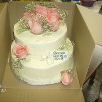 Going Away Flower Cake Stacked cake 8 and 10 inch with never ever again cream cheese icing, very tasty but impossible to smooth. Yellow cake moistened with lemon...