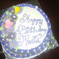 Ri Flowers nothing big just a couple of ri flowers. also the cake is actually white and purple but looks somewhat blue in the pic