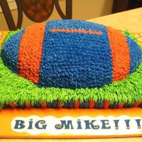 Auburn Football Yellow cakes with buttercream icing. This cake was the first one I had ever had to break. The bottom cake is pieced together.