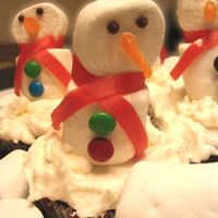 Snowman Cupcakes These were made for my daughter's class party. She watched way too much Food Network (She's 7!!) and saw Sandra Lee make these...