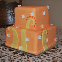Orange Bridal Shower Cake This cake was made for a girl for her bridal shower. Her colors were orange and yellow. It's 6" and 9" square cakes covered...